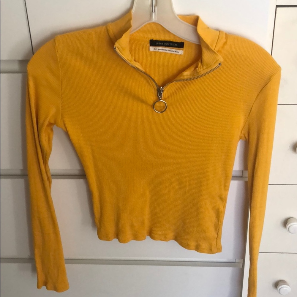 Yellow crop top.